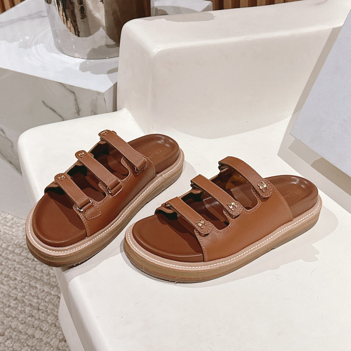 TRIOMPHE SANDALS IN BROWN CALFSKIN