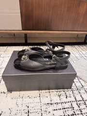 FLAT SLINGBACKS IN BLACK CALFSKIN