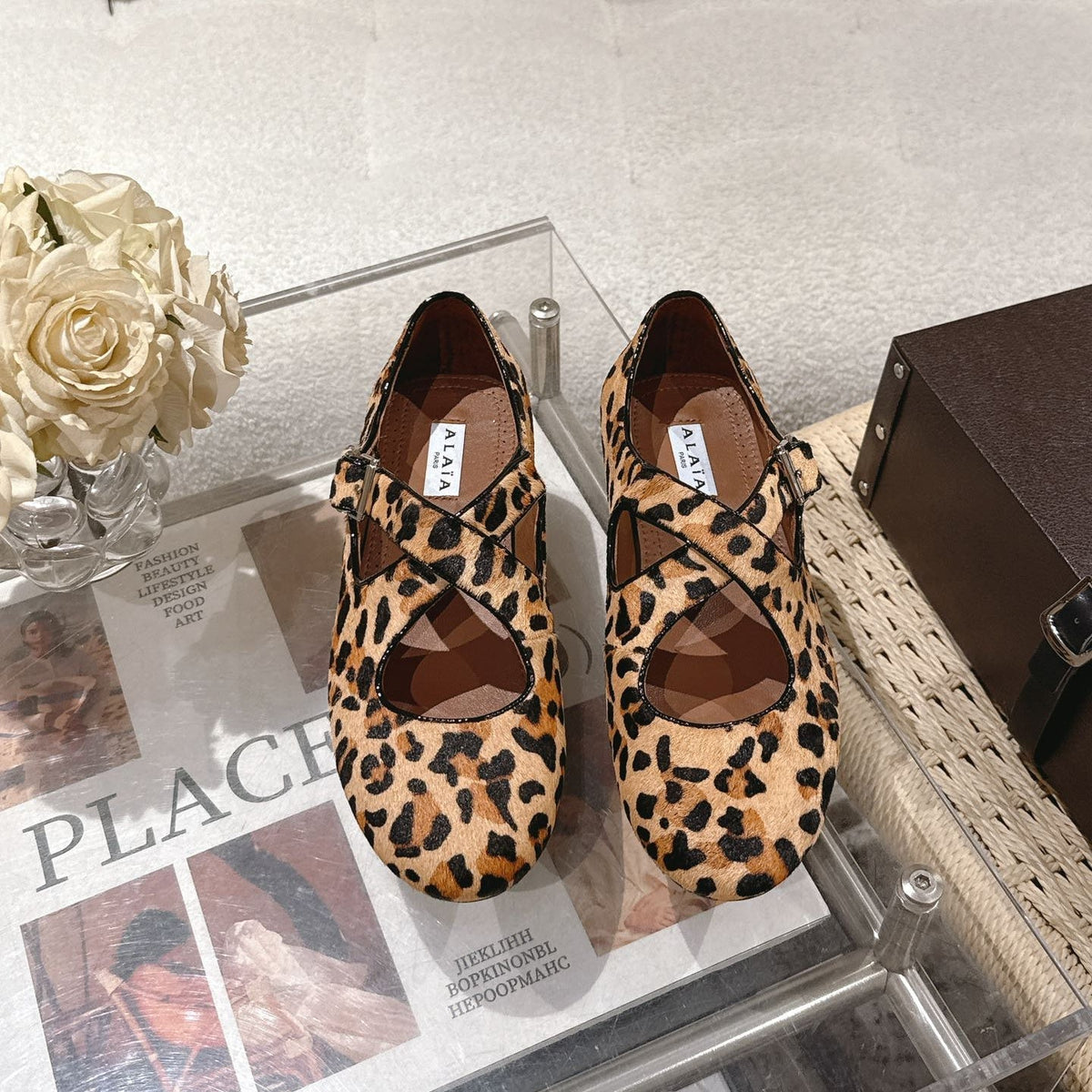 ALAIA 25S CRISS CROSS BALLET FLATS IN LEOPARD SUEDE