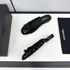 BOW MULE IN BLACK FABRIC AND CALFSKIN