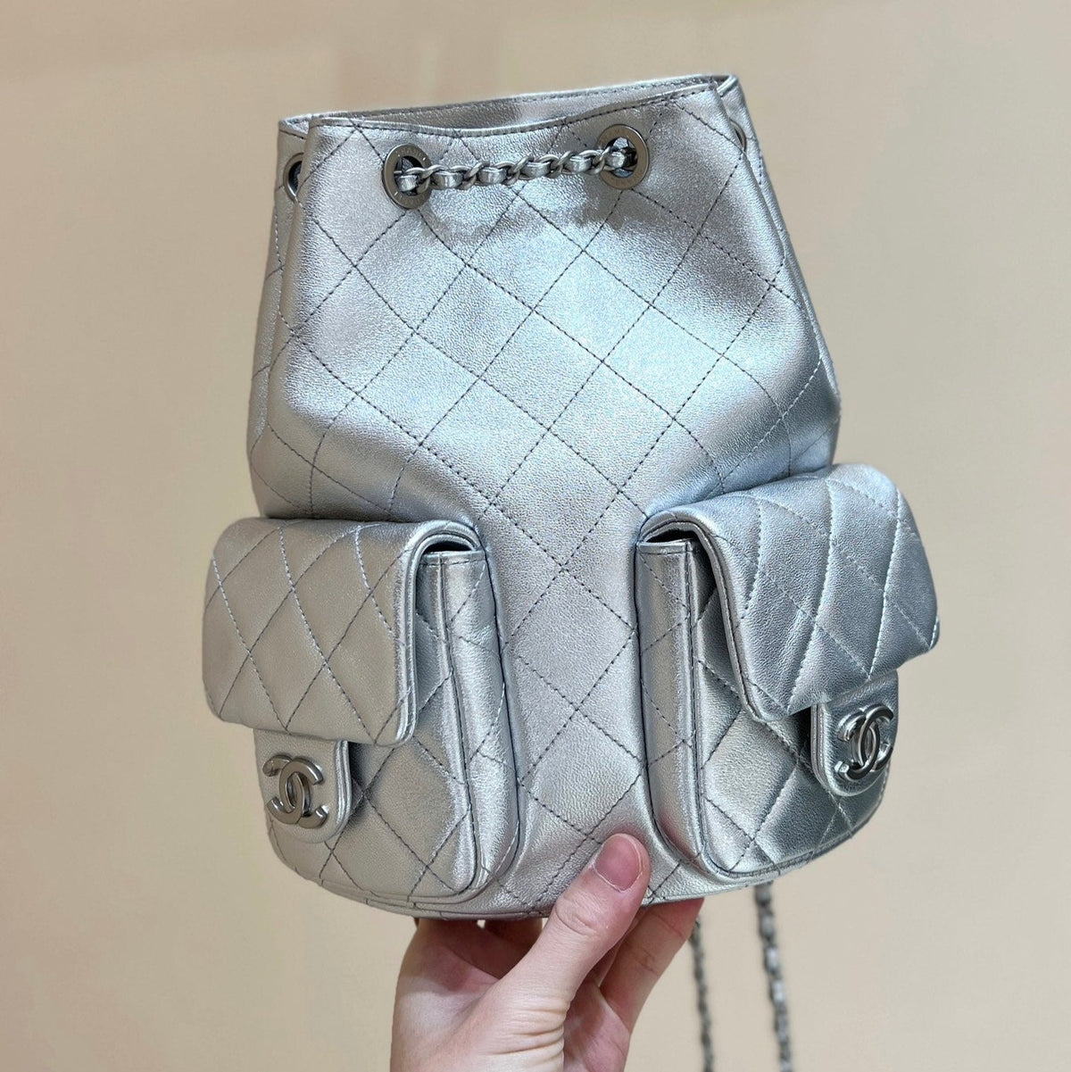 DRAWSTRING BUCKET BACKPACK 24 IN SILVER-TONE LAMBSKIN SILVER HARDWARE