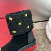 ANKLE STUDDED BOOTS IN BLACK SUEDE AND SHEARLING LINING