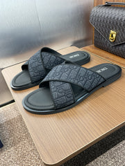 DIOR 25S ALIAS CROSS-STRAP SLIDES IN BLACK CALFSKIN WITH CD OBLIQUE DARK BLUE LOGO