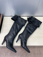 YSL 25S HIGH‑HEEL FRINGED MARTIN BOOTS 90 MM IN BLACK LAMBSKIN