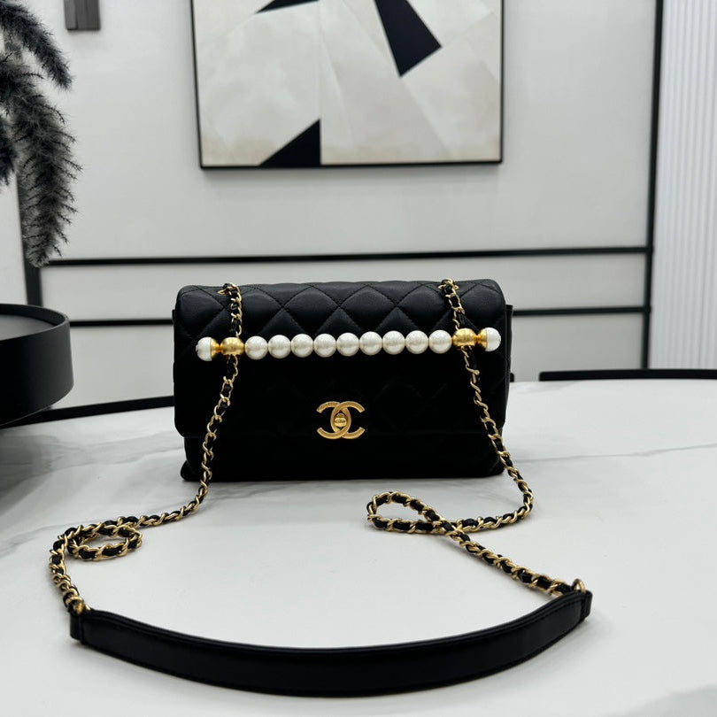 CHANEL 25S FLAP BAG 23 CM IN BLACK LAMBSKIN WITH PEARL TOP HANDLE