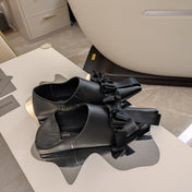 POINTED-TOE FLATS WITH BOW IN BLACK SOFT LAMBSKIN