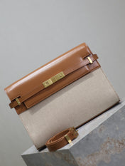 MANHATTAN MEDIUM 29 IN WHITE CANVAS AND BROWN CALFSKIN GOLD BUCKLE