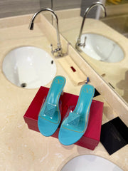 HIGH MULE 60MM IN AQUA BLUE SHEEPSKIN AND TRANSPARENT PVC