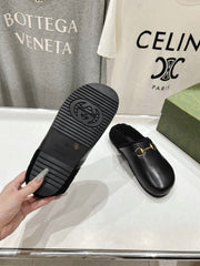 HORSEBIT MULE IN BLACK CALFSKIN AND FLEECE LINING