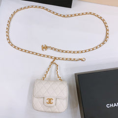 CHAIN BELT WITH GOLD METAL WHITE CALFSKIN INTERLINKING STRAPS AND MINI BAG ATTACHMENT