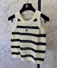 Black and beige hollow knitted vest