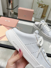 SNEAKER MULES IN WHITE BLEACHED CALFSKIN
